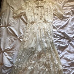 Embroided White v cut dress